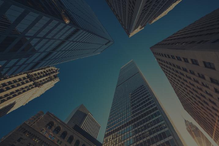 shot from below of tall city buildings 